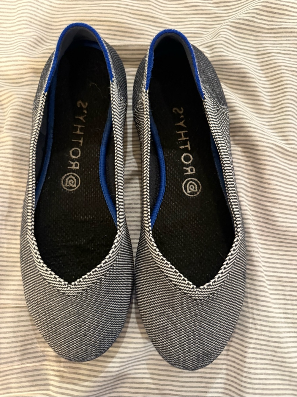 Rothy's The Flat in charcoal birdseye knit with the signature blue deal 9.5
